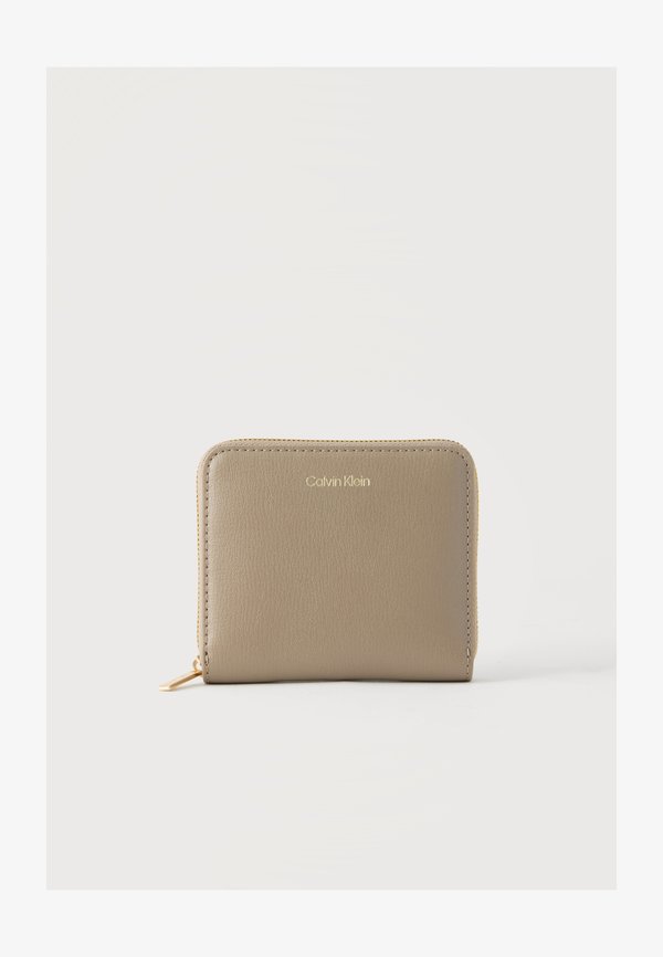 Calvin Klein LOGO MEDIUM ZIP AROUND - Wallet - desert taupe