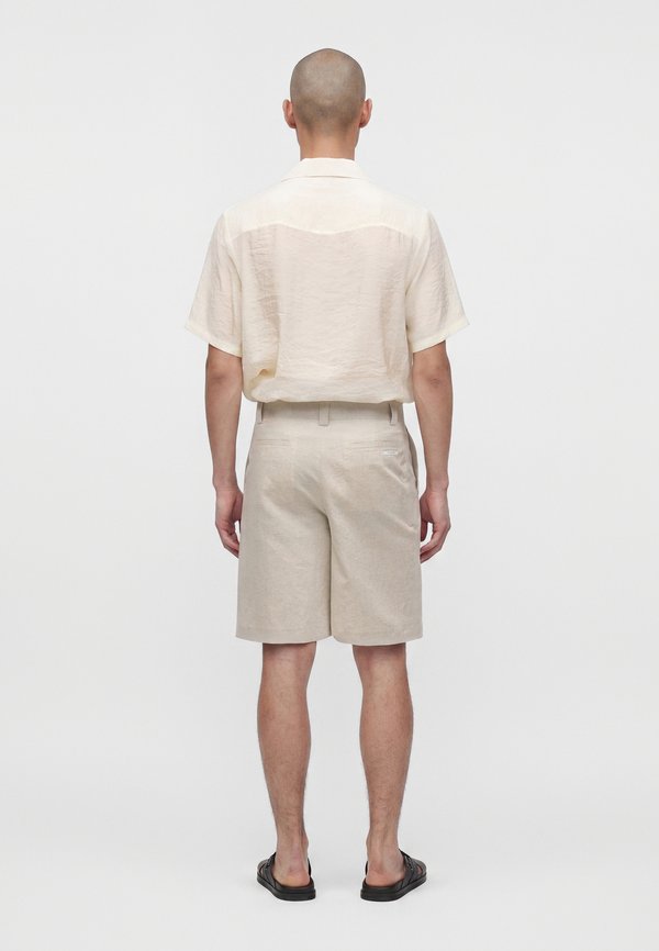 Maison Kitsuné PLEATED