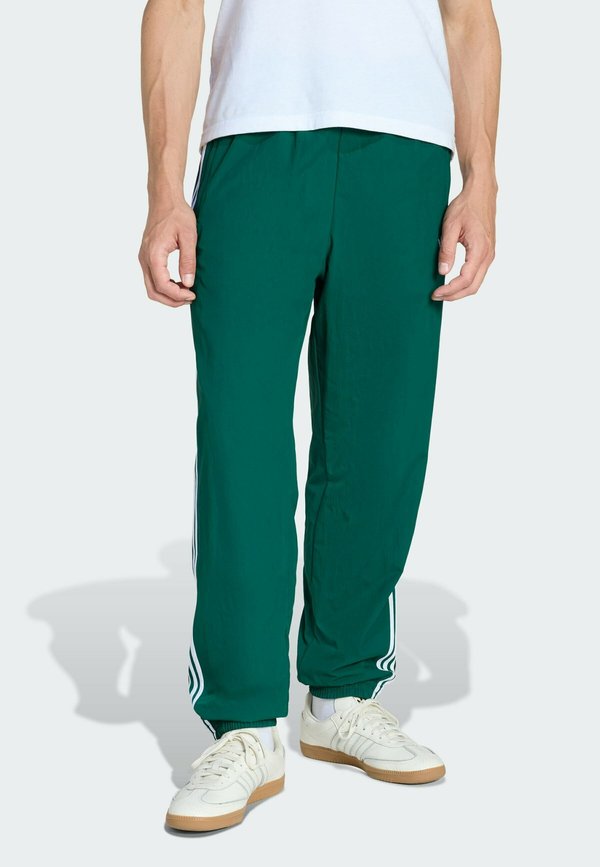 adidas Originals FIREBIRD - Tracksuit bottoms - collegiate green
