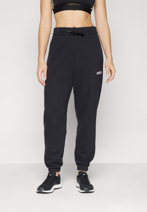 adidas Sportswear ESSENTIALS LINEAR CUFFED PANTS - Tracksuit bottoms - black/white
