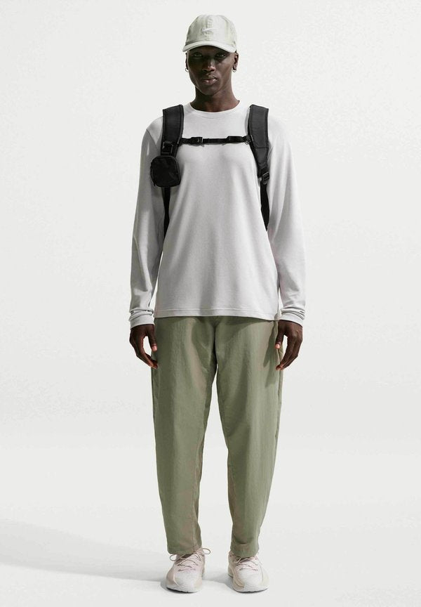 Nike Performance M NK DF NAC WOVEN PANT - Trousers - light army/pale ivory/light army