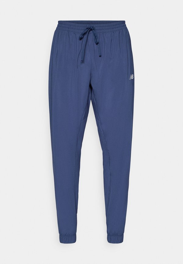 New Balance SPORT ESSENTIALS JOGGER - Tracksuit bottoms - navy