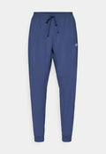 New Balance SPORT ESSENTIALS JOGGER - Tracksuit bottoms - navy