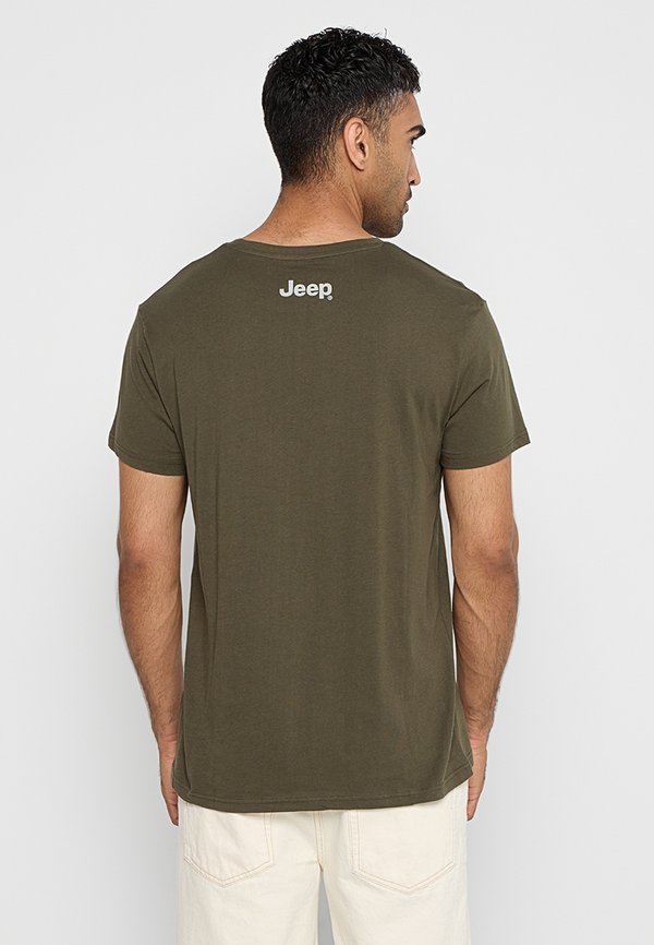 JEEP GRILLE NEWSPAPER