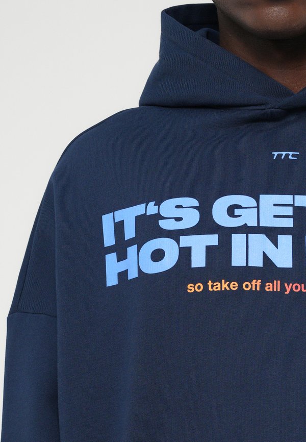 The Tracksuit Club HOODIE HOT IN HERE