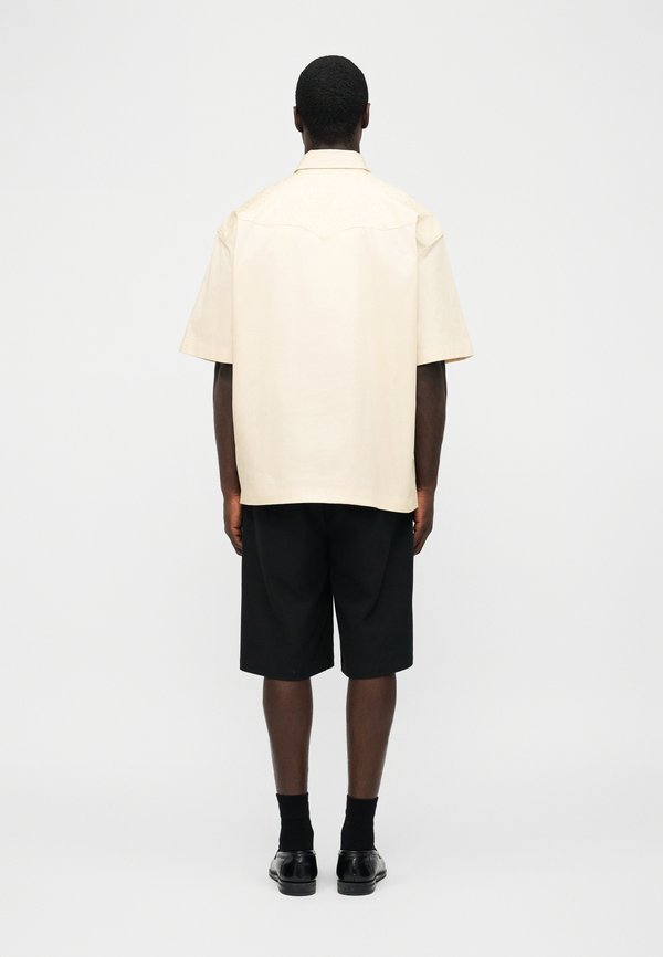 Les Benjamins UNISEX