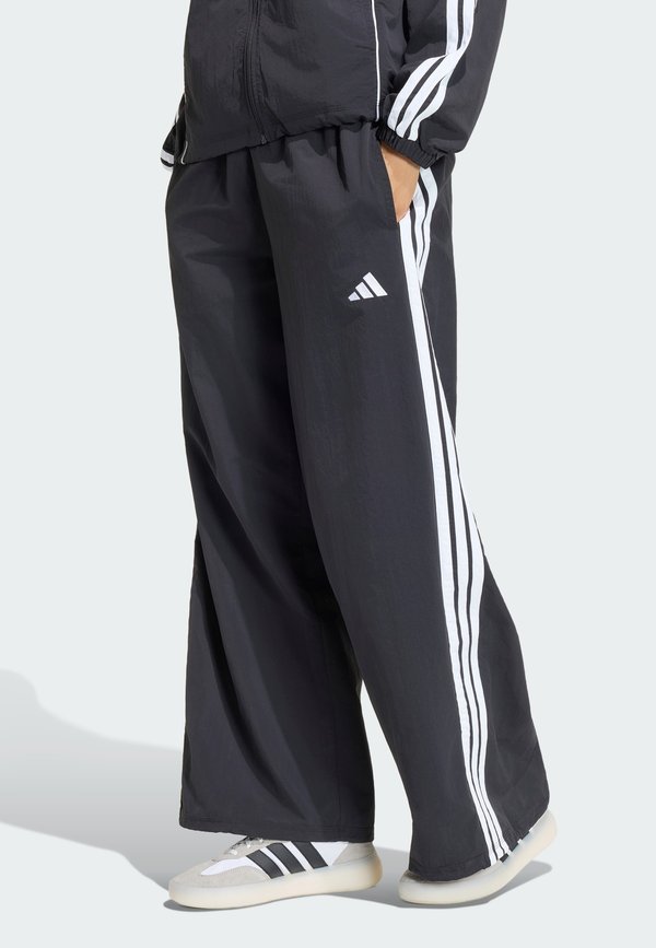 adidas Sportswear Tracksuit bottoms - black/white