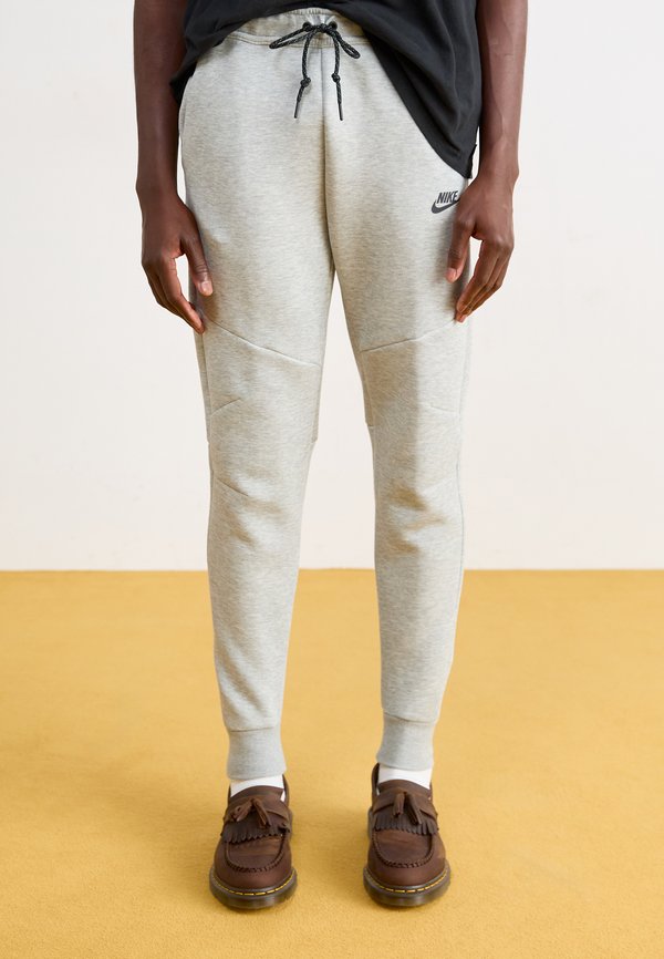 Nike Sportswear Tracksuit bottoms - dark grey heather/black