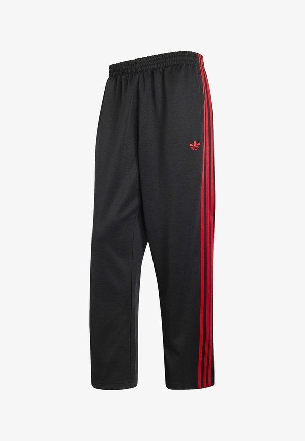 adidas Originals LOOSE  - Tracksuit bottoms - black/vivid red