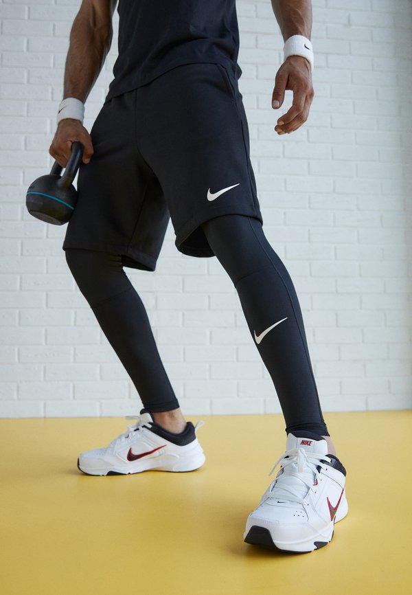 Nike Performance DEFY ALL DAY - Training shoe - white/black/medium brown/particle grey