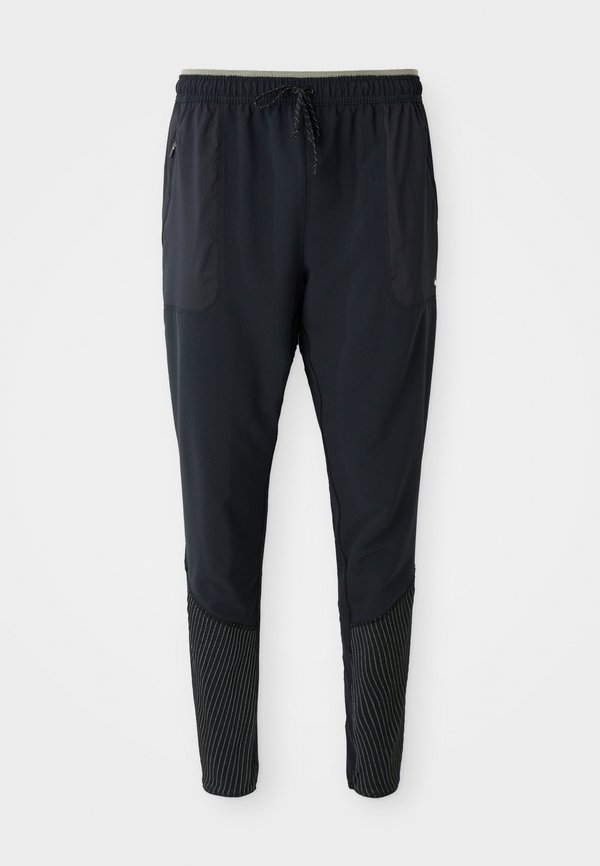 Nike Performance REFLECT PANT - Tracksuit bottoms - black