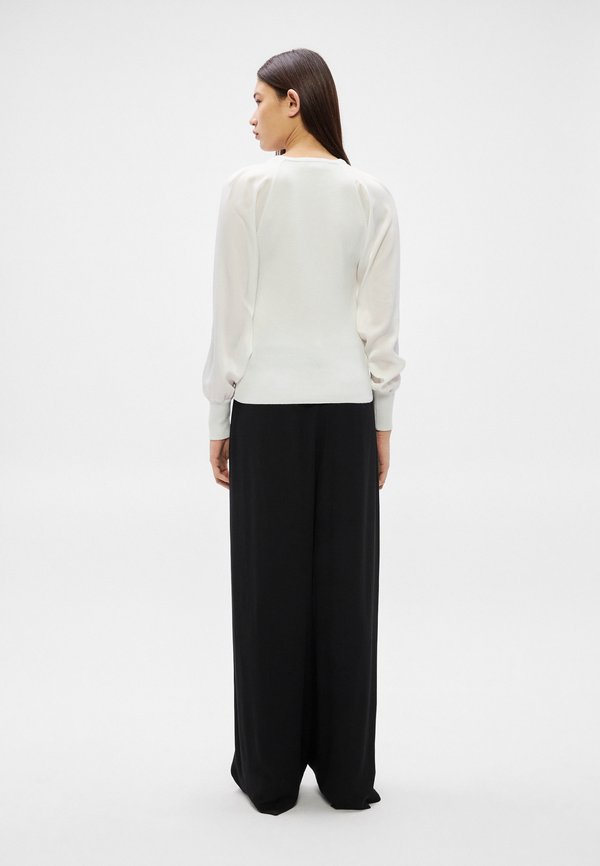 DKNY MIX MEDIA