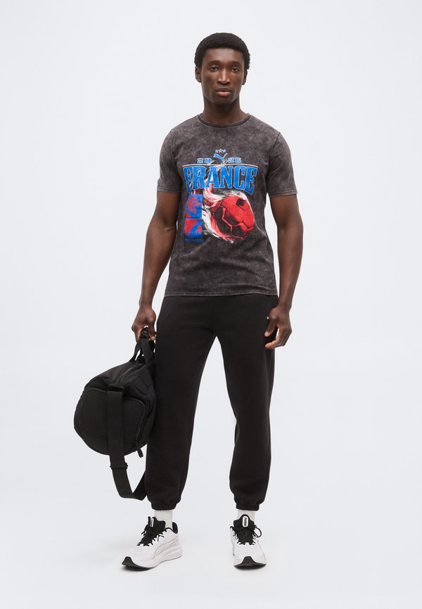 Puma FANPACK 90S TEE GERMANY