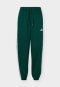 adidas Sportswear ESSENTIALS 3 STRIPES LOOSE PANTS - Tracksuit bottoms - collegiate green/ivory