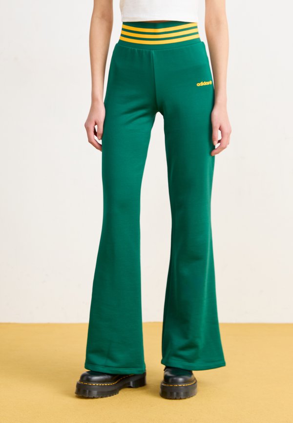 adidas Originals FLARED PANTS - Tracksuit bottoms - collegiate green