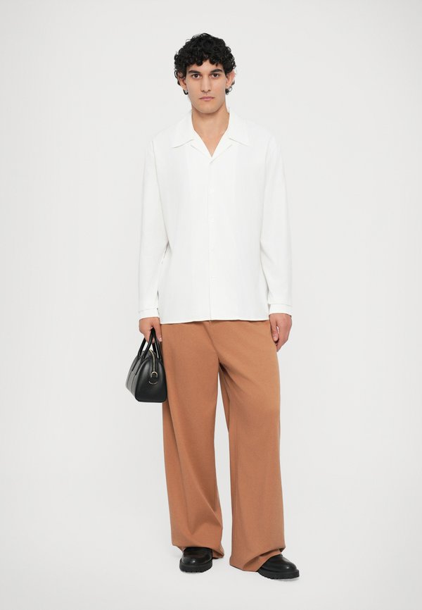Essential Collective SHIRT