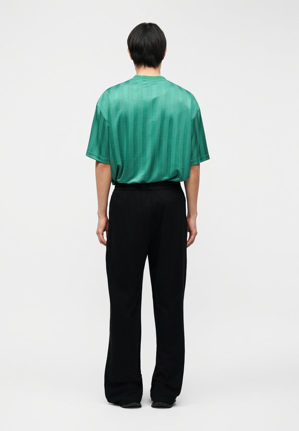 Han Kjøbenhavn LOGO TRAINING TROUSERS