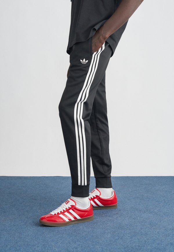 adidas Originals SST TP - Tracksuit bottoms - black