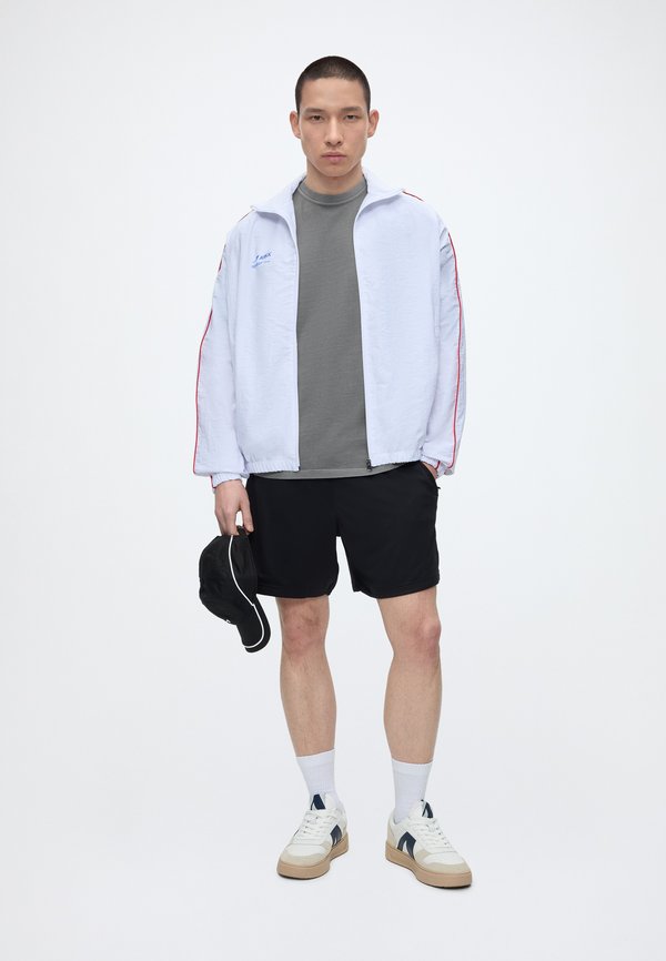 ARKK Copenhagen LOGO BOXY TEE UNISEX
