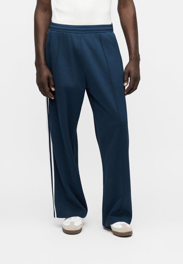 adidas Originals Tracksuit bottoms - night indigo