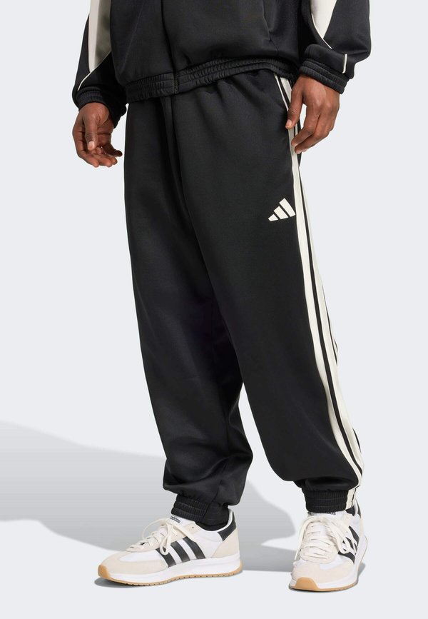 adidas Sportswear STADIUM TRACK - Tracksuit bottoms - black/off-white
