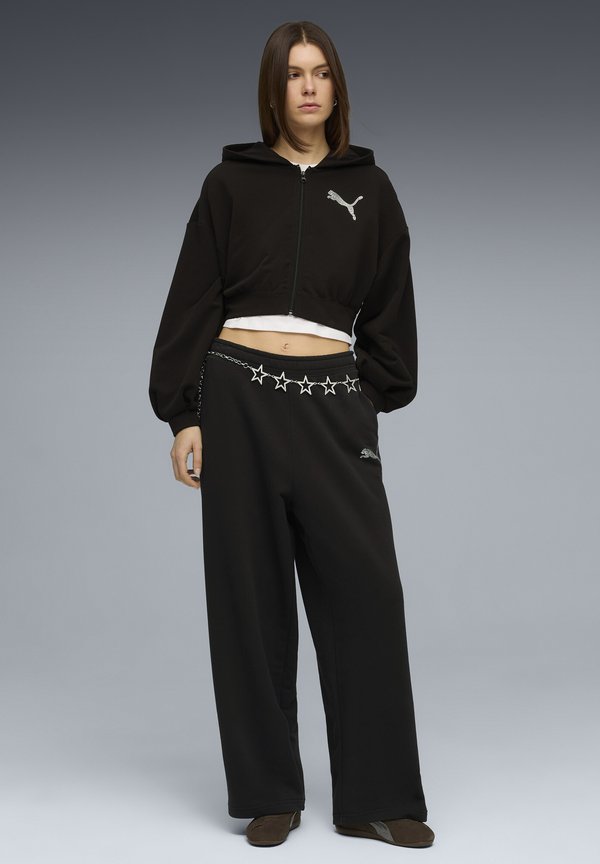 Puma GRAPHIC LEO LUXE BEDAZZLED SLOUCHY - Tracksuit bottoms - puma black