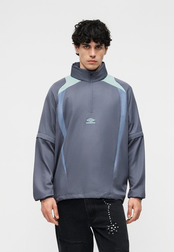 Umbro ZIP OFF SLEEVE WIND JACKET