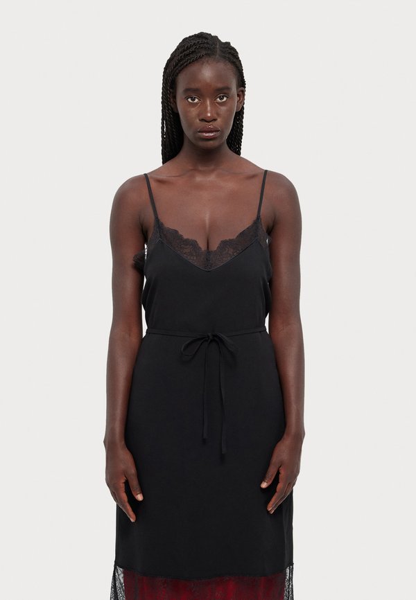 MOSCHINO ABITO