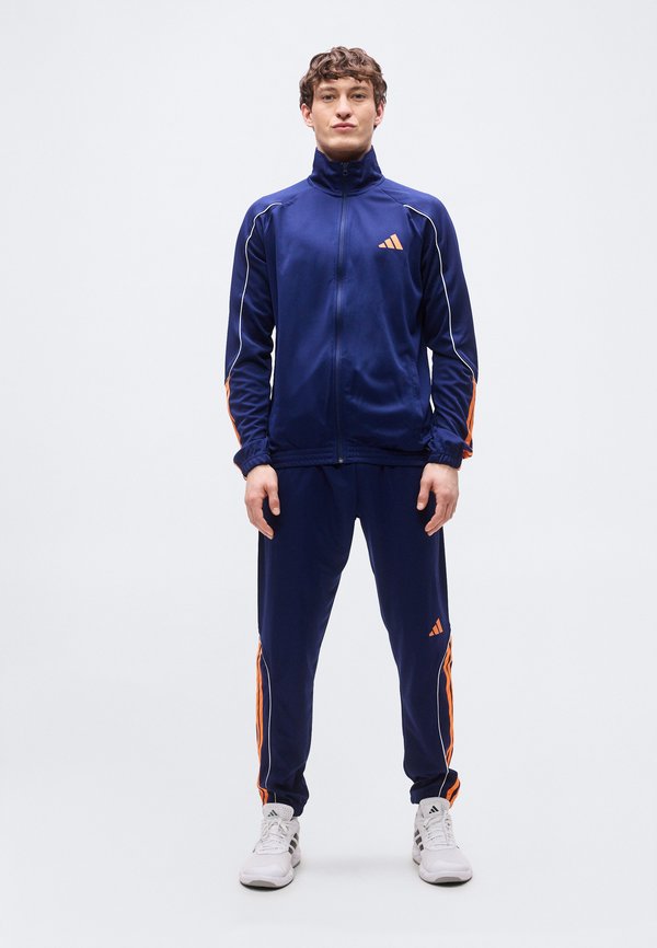 adidas Sportswear STADIUM 3 STRIPES TRACKSUIT - Tracksuit - dark blue/pure orange