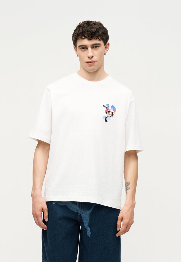 Puma GRAPHICS PSYCHO FLOWER BOXY TEE