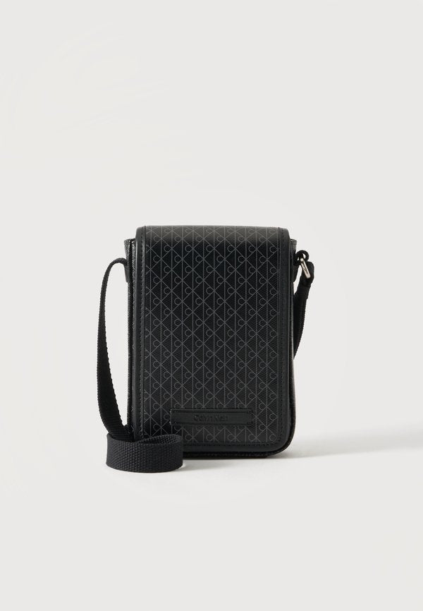 Calvin Klein EMBLEM - Phone pouch - black