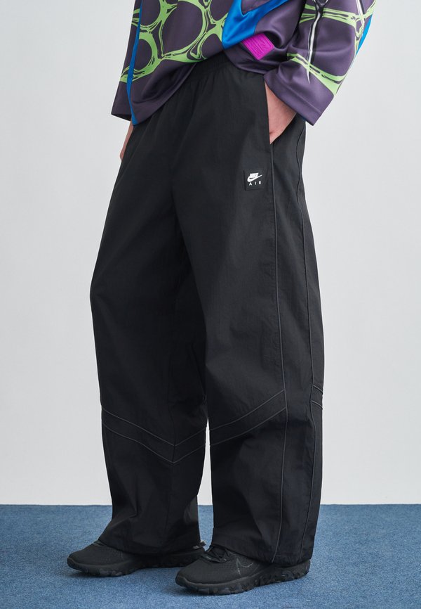 Nike Sportswear PANT - Tracksuit bottoms - black