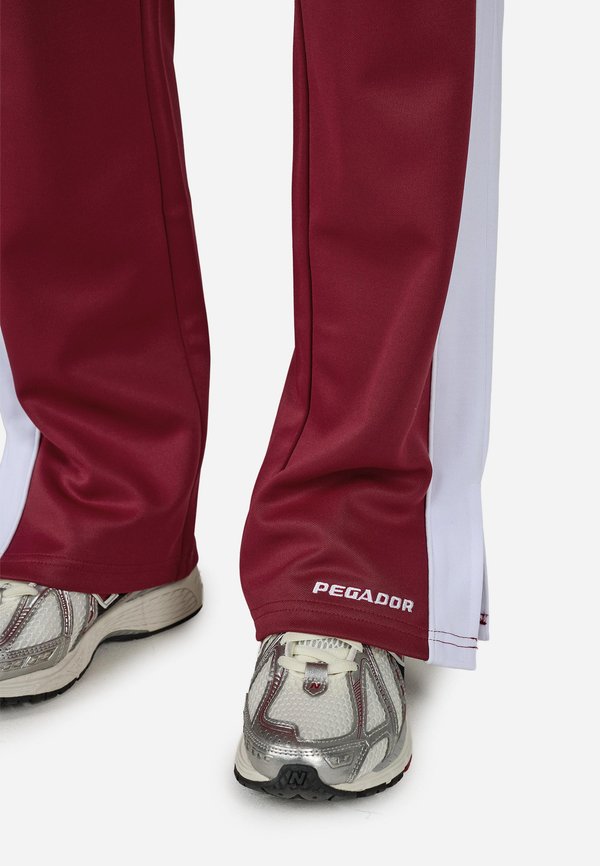 Pegador MARTERA TRACK PANTS
