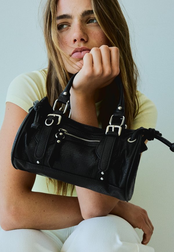 Bershka BUCKLED - MINI BAG - Handbag - black