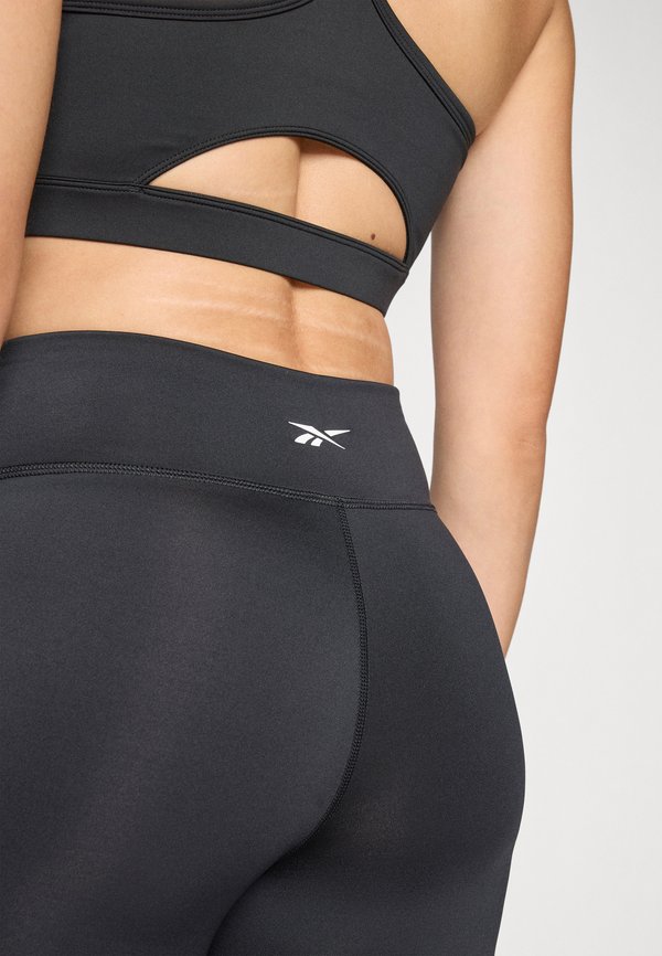 Reebok TRAIN HIGH RISE BOOTCUT LEGGINGS
