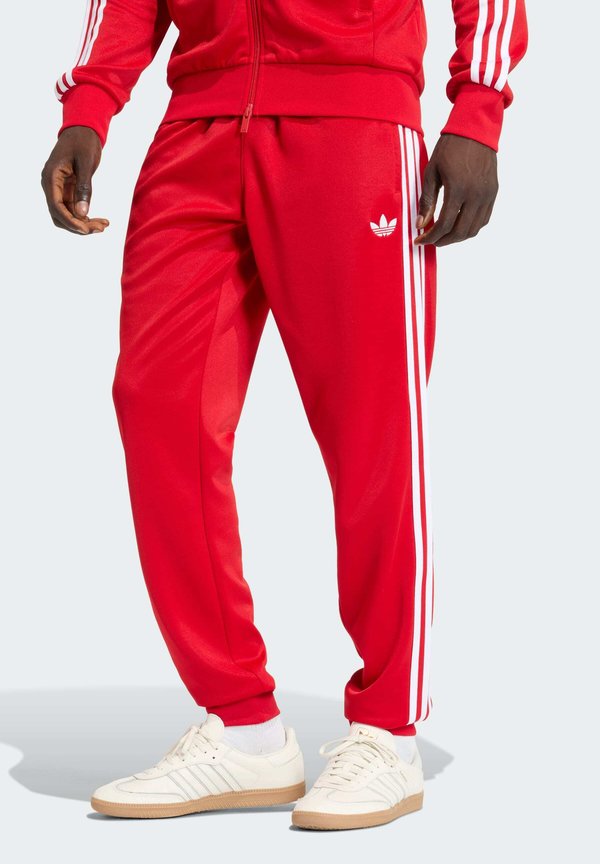 adidas Originals SST TP - Tracksuit bottoms - better scarlet