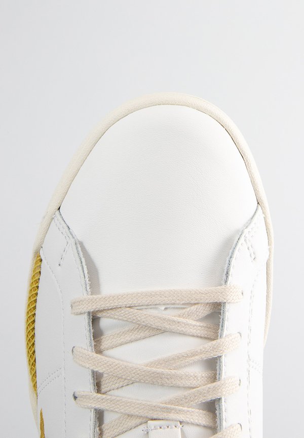 le coq sportif STADIUM