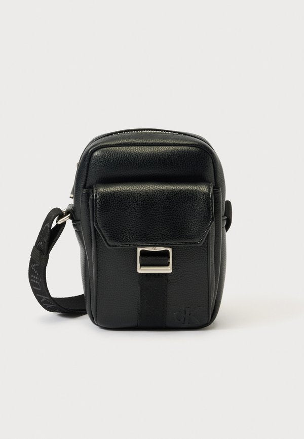 Calvin Klein WEBBING STRAP SLIM REPORTER - Cross body bag - black