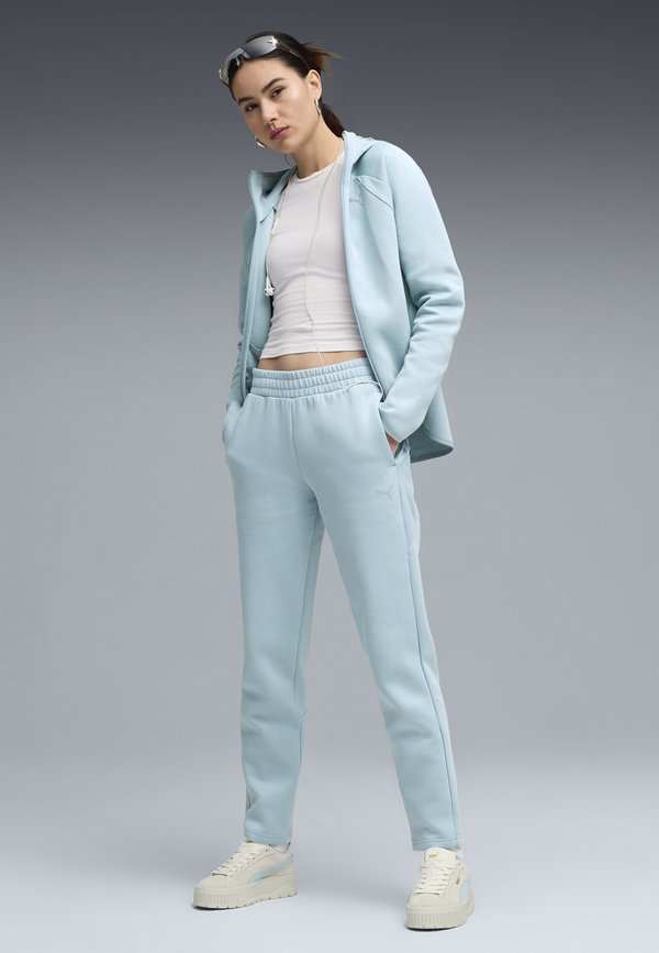 Puma EVOSTRIPE JOGGING - Tracksuit bottoms - seafoam