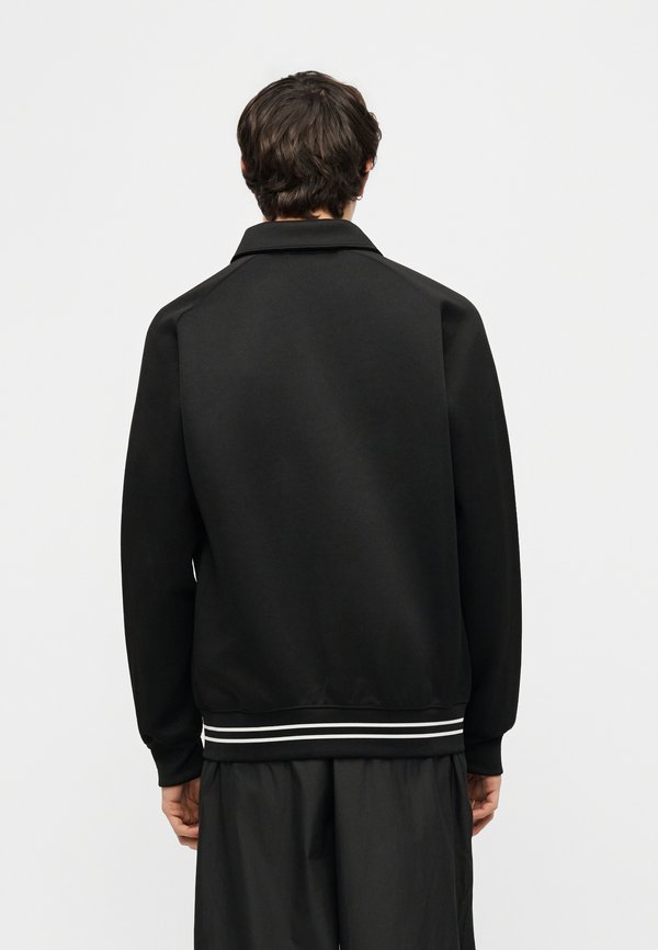 Puma T7 RELAXED BIG CAT TRACK JACKET DK