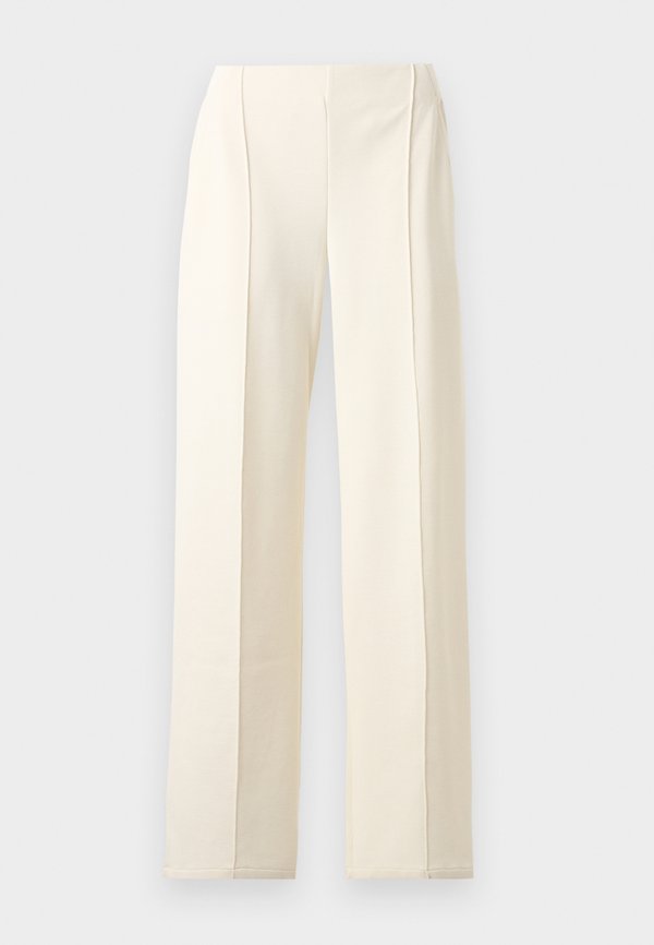 New Balance SPORT LEGACY - Tracksuit bottoms - angora
