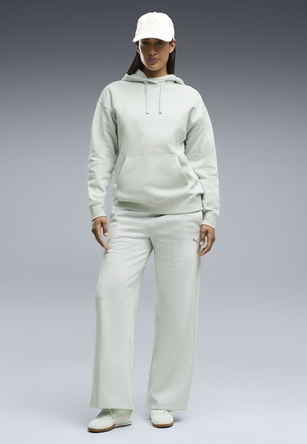 Puma ESSENTIALS CAT FLEECE HOSE MIT WEITEM BEIN - Tracksuit bottoms - créme de mint