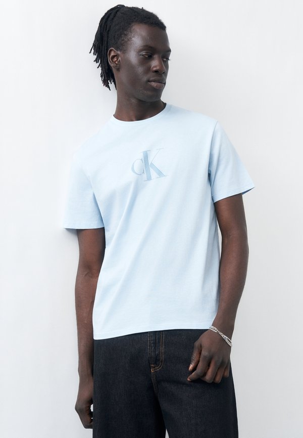 Calvin Klein DISTRESS MONOGRAM GRAPHIC TEE - Print T-shirt - breezy blue
