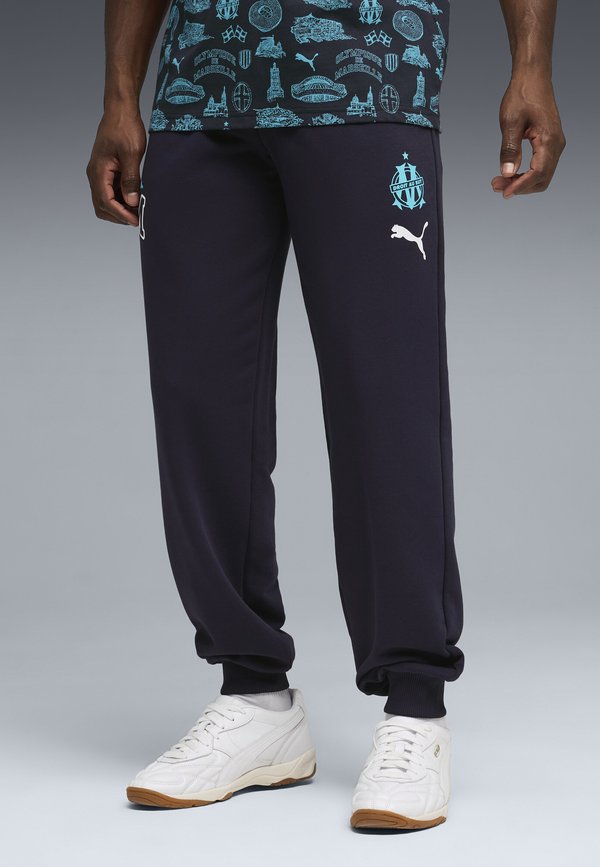 Puma OLYMPIQUE DE MARSEILLE FTBLCULTURE - Tracksuit bottoms - new navy-bright aqua