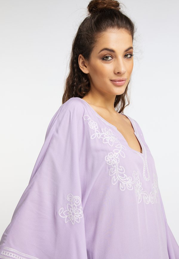 usha PONCHO CARNEA