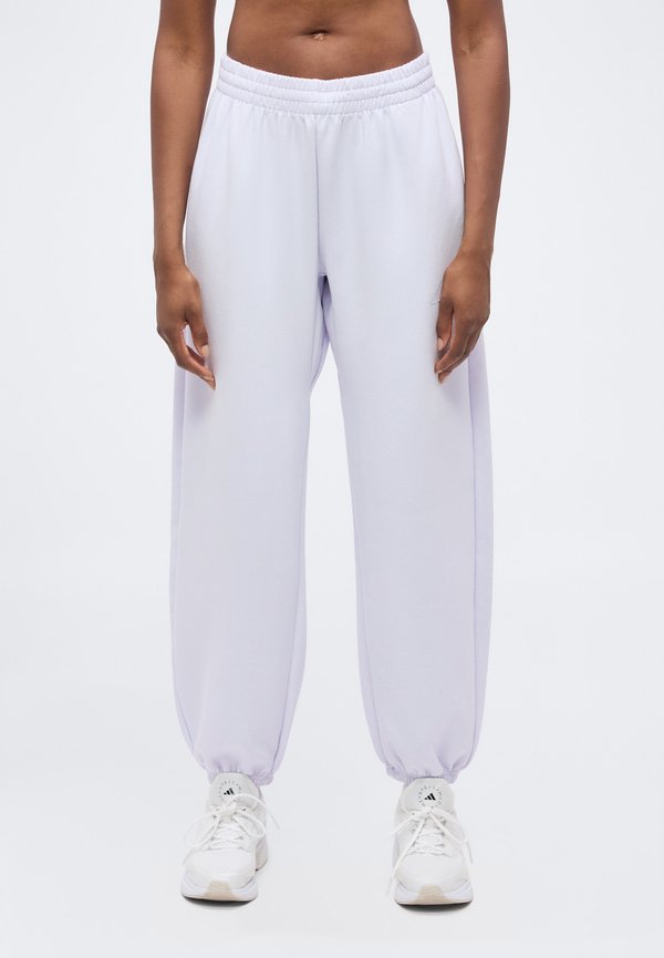 adidas Sportswear SOFT LUX PANTS - Tracksuit bottoms - frozen purple