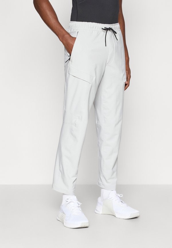 Nike Performance CARGO - Tracksuit bottoms - grey fog/black