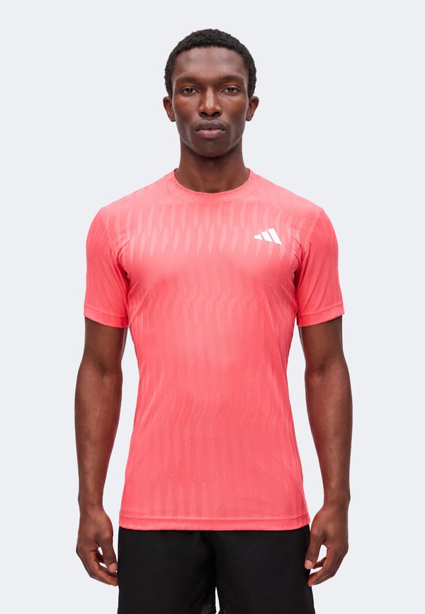 adidas Performance FREELIFT TEE - Sports T-shirt - pure turbo