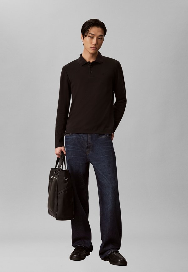 Calvin Klein RAISED LOGO  - Handbag - black
