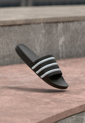 adidas Originals ADILETTE OG UNISEX - Mules - core black/footwear white